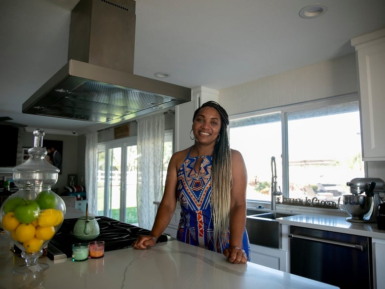 Sharie Wilson in the kitchen of her remodeled Elk Grove home on June 22, 2020. Wilson says that when the bought the home it was the ‘worst on the block’ but was able to turn it into a space that she’s proud of.