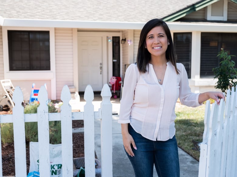 Vivianne Nocon poses outside her Elk Grove home from where she works for SMUD, Thursday, July 16, 2020.