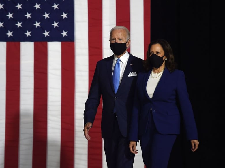 Presumptive Democratic presidential nominee Joe Biden and his vice presidential running mate, Kamala Harris, arrive to conduct their first appearance together in Wilmington, Del., on Wednesday.