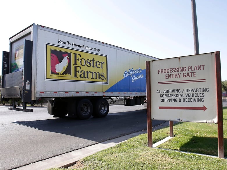In this Thursday, Oct. 10, 2013, file photo, a truck enters the Foster Farms processing plant, in Livingston, Calif.