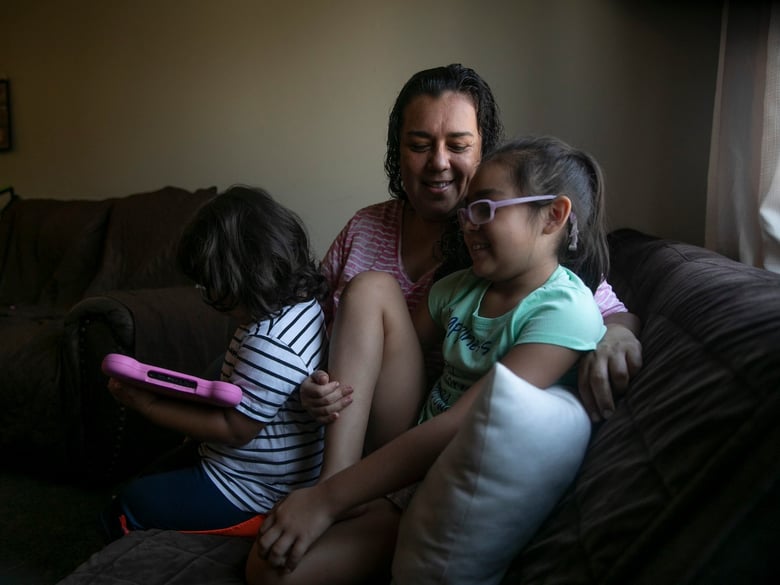 Mariana with her children on September 7, 2020. The family of four shares a one-bedroom apartment in National City but have fallen behind on rent payment due to Mariana and her husband both losing months of work amid the pandemic.