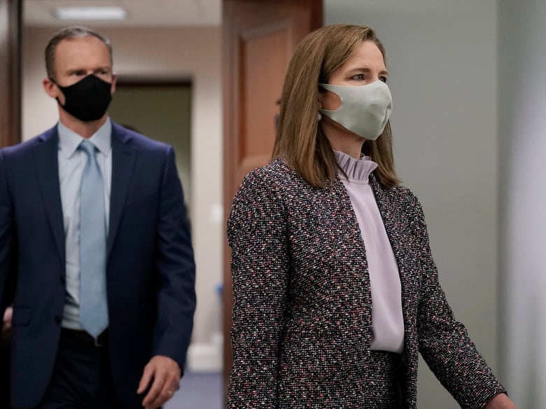 Supreme Court nominee Amy Coney Barrett arrives Wednesday for the third day of her confirmation hearing with the Senate Judiciary Committee.