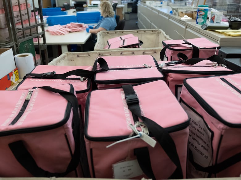 Ballot boxes wait to be opened by registrar employees on Tuesday, Nov, 3, 2020.