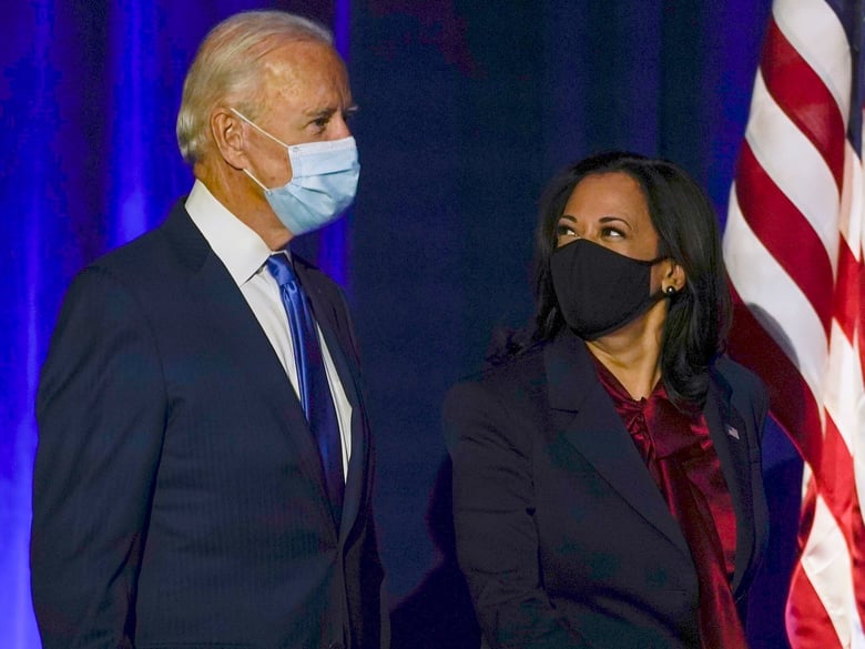 President-elect Joe Biden arrives with his running mate, Vice President-elect Kamala Harris to speak in Wilmington, Delaware, on the evening before the Associated Press called the race for them.