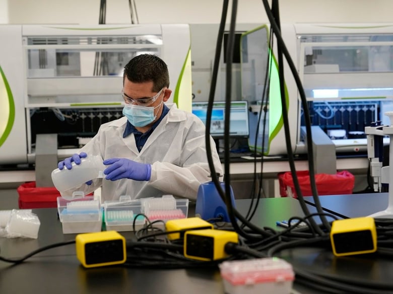 A technician conducts COVID-19 tests at a facility in Valencia on Oct. 30, 2020.