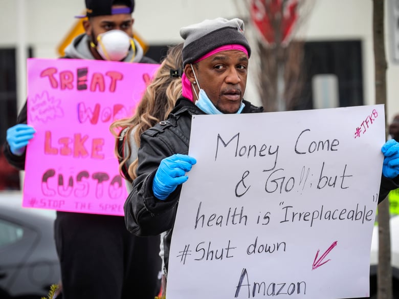 In this March 30, 2020, file photo, workers at an Amazon fulfillment center in the Staten Island borough of New York protest conditions in the company's warehouse.