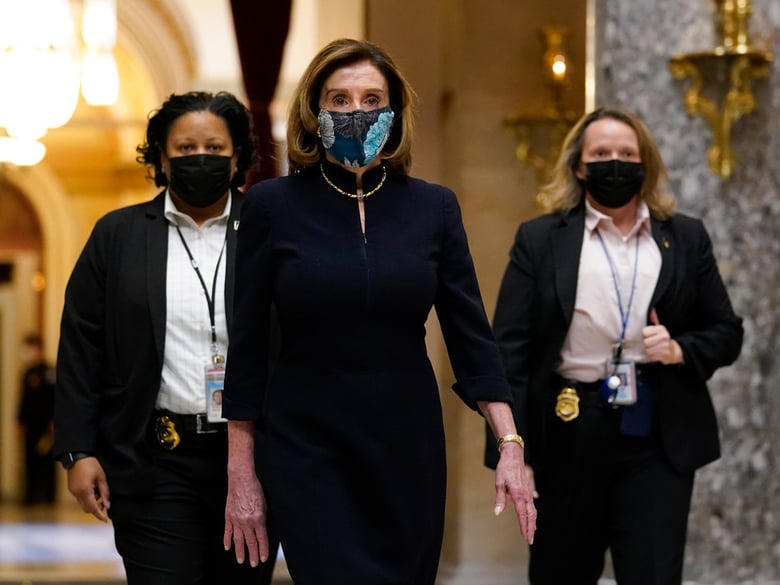 Speaker of the House Nancy Pelosi of Calif., walks through Statuary Hall on Capitol Hill on Wednesday.