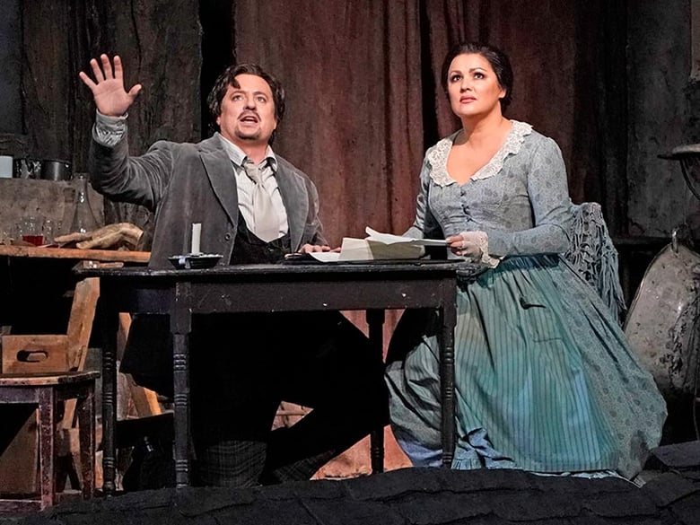 Mathew Polenzani and Anna Netrebko in Puccini's "La Bohème." | photo: Ken Howard / Met Opera