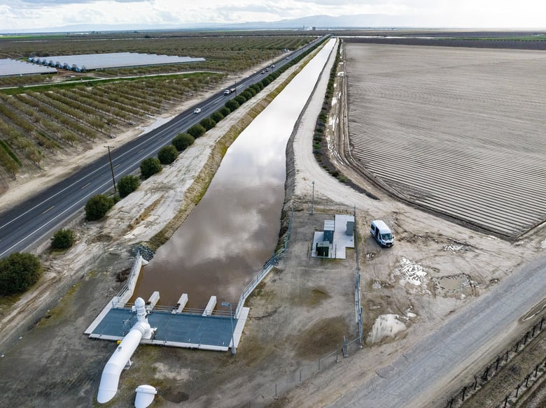In this aerial drone photo provided by the California Department of Water Resources, the primary pump in the foreground is part of a groundwater recharge project which captures excess flow for groundwater storage in Fresno County on March 13, 2023.
