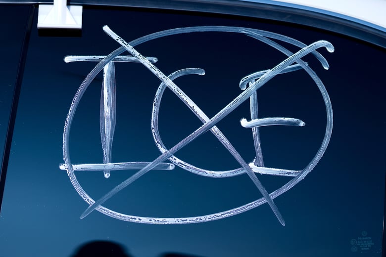 A sign is painted on the window of a vehicle as demonstrators shut down the 101 freeway during a protest calling for immigration reform Sunday, Feb. 2, 2025, in Los Angeles. A sign is painted on the window of a vehicle as demonstrators shut down the 101 freeway during a protest calling for immigration reform Sunday, Feb. 2, 2025, in Los Angeles.