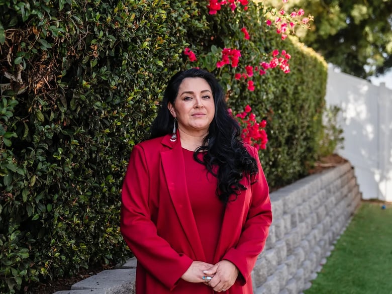 Liz Perez, owner of GC Green, a general contracting and consulting firm that focuses on clean energy, at her home in Vista on Jan. 31, 2025. Perez says uncertainty around Trump's orders could lead lead businesses to reduce investment and hiring.