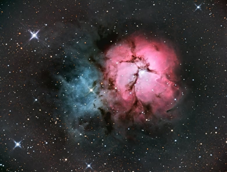 An image of the Trifid Nebula, also known as Messier 20, photographed at the Community Observatory in Placerville.