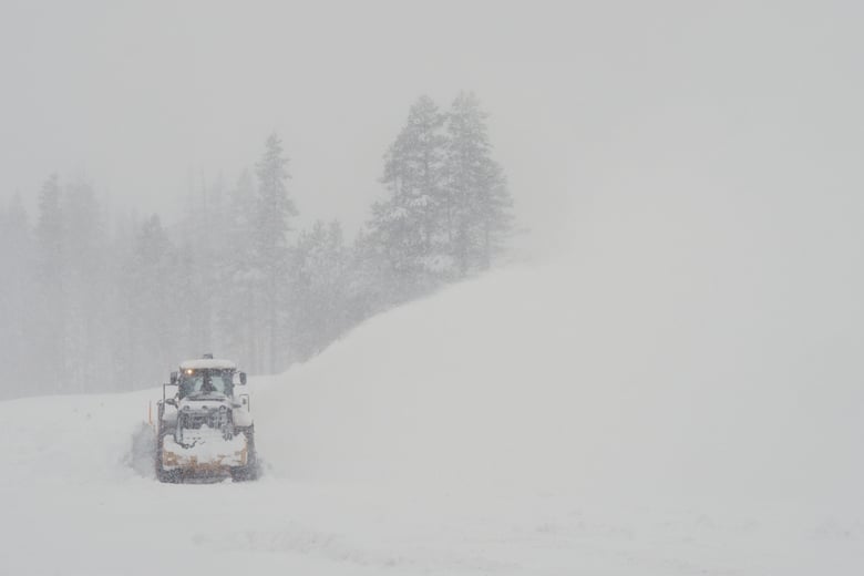 A road is cleared during a snow storm on Wednesday, Feb. 18, 2026 near Soda Springs, Calif.