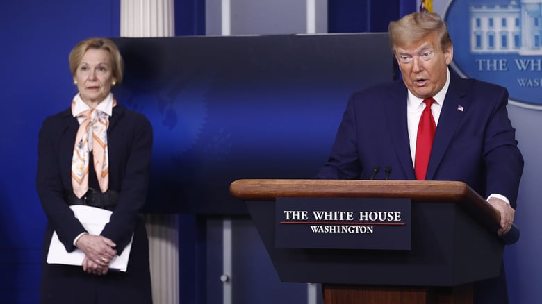 President Trump speaks during a coronavirus task force briefing at the White House on April 18, 2020. White House coronavirus response coordinator, Dr. Deborah Birx, stands at left.