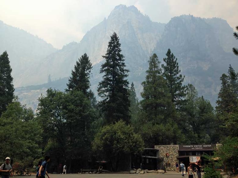 Smoke from the El Portal fire fills Yosemite Valley Sunday afternoon, although the park, and all entrances and roads within the park, remains open. 