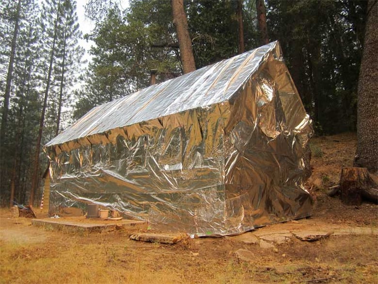 Wrapped cabin at Placer Guard Station.