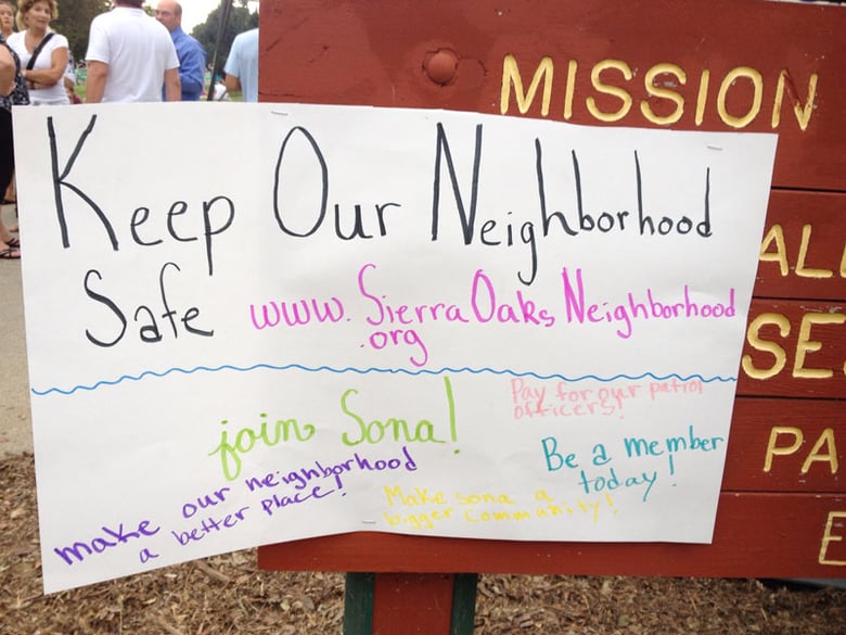 “Keep Our Neighborhood Safe” sign at Sierra Oaks Night Out event in Oak Meadow Park Tuesday night.