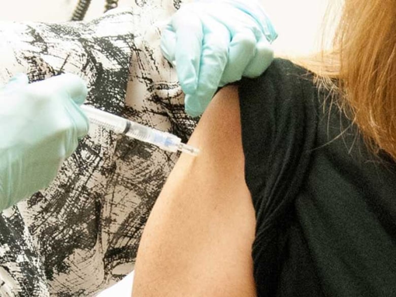 A 39-year-old woman, the first participant enrolled in the Phase 1 clinical trial VRC 207, received a dose of the investigational NIAID/GSK Ebola vaccine at the NIH Clinical Center in Bethesda, Maryland, on September 2, 2014.