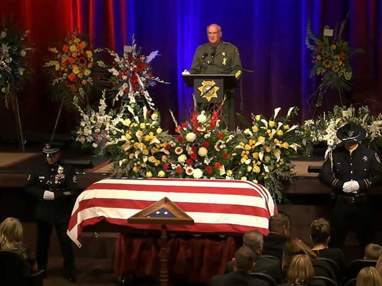 Placer County Sheriff's Detective Michael Davis is remembered during a memorial service Tuesday.