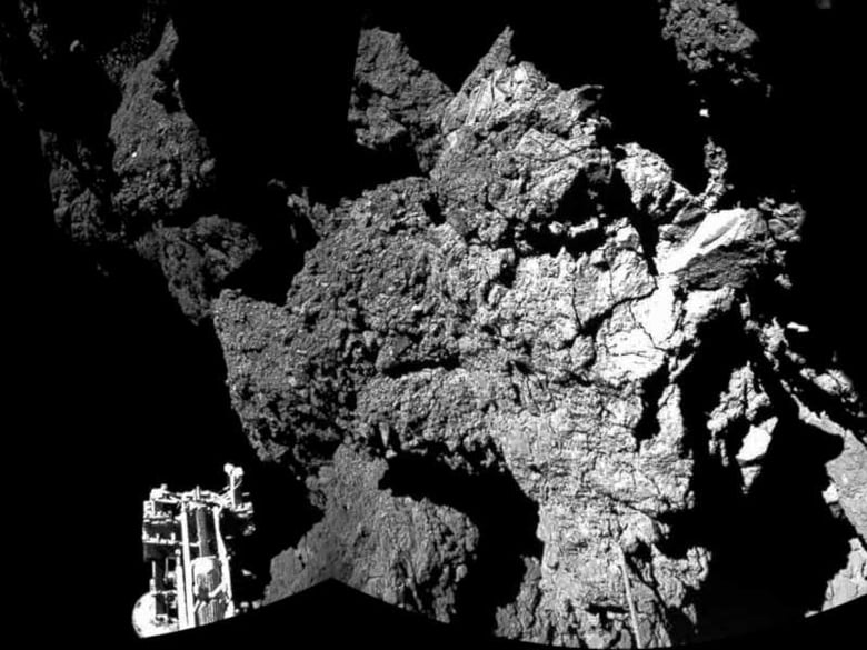 A two-image mosaic taken on Nov. 12, 2014, by Rosetta's Philae lander's CIVA camera. It confirms Philae landed safely on Comet 67P/Churyumov-Gerasimenko. 