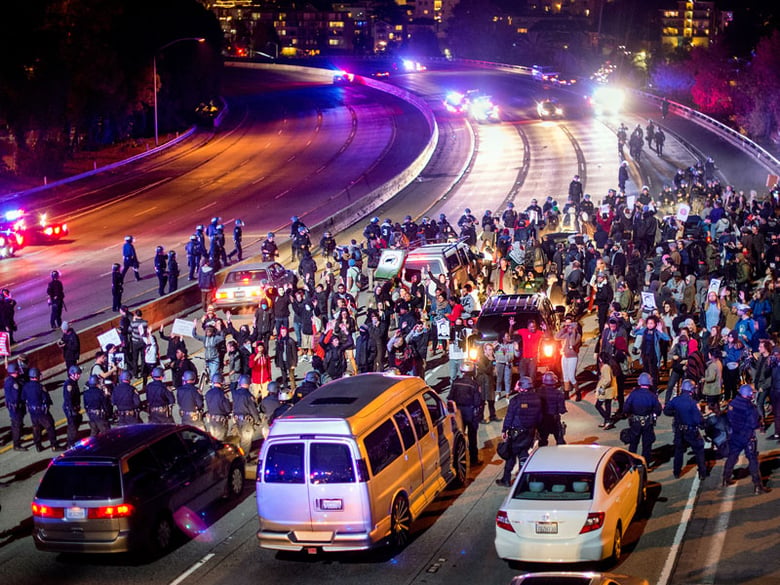 Protesters block Interstate 580 in Oakland, Calif., on Monday, Nov. 24, 2014, after the announcement of the grand jury decision not to indict Ferguson police officer Darren Wilson in the fatal shooting of Michael Brown, an unarmed 18-year-old.