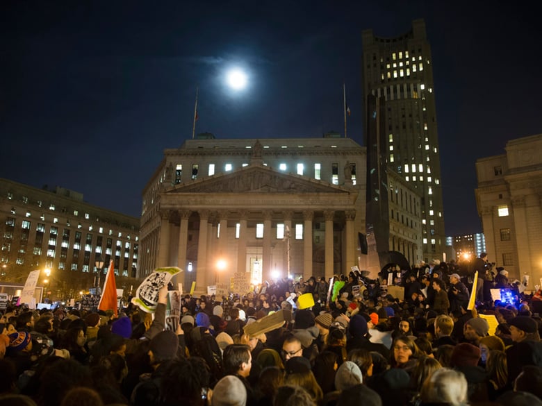 Demonstrators participate in a rally against a grand jury's decision not to indict the police officer involved in the death of Eric Garner, Thursday, Dec. 4, 2014, in New York.