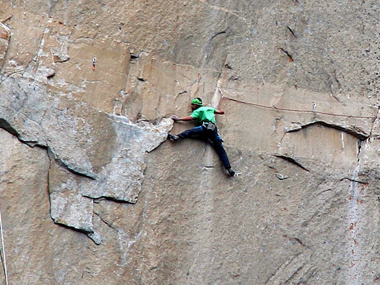 In this Jan. 9, 2015 photo provided by Tom Evans, Kevin Jorgeson climbs on what is known as pitch 15.