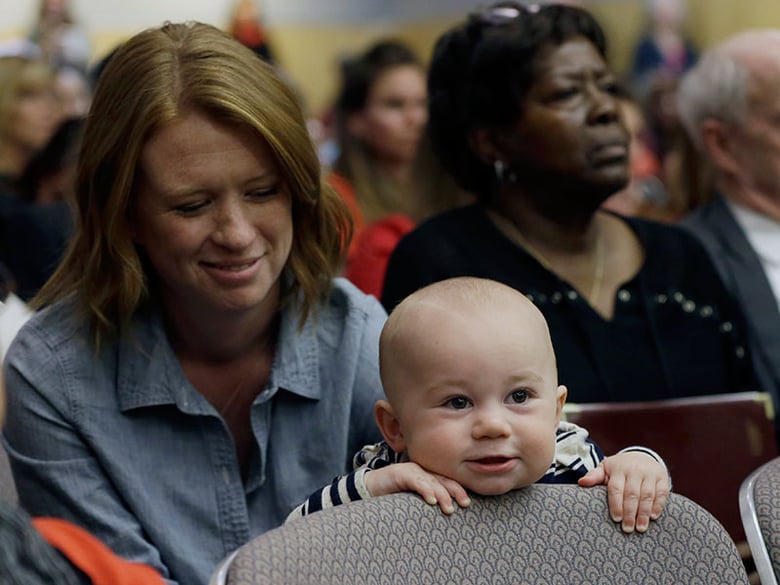 Jennifer Wonnacott, a supporter of a measure requiring California schoolchildren to get vaccinated, keeps an eye on her son, Gavin, at a hearing at the Capitol in Sacramento, Calif., Wednesday, April 8, 2015.