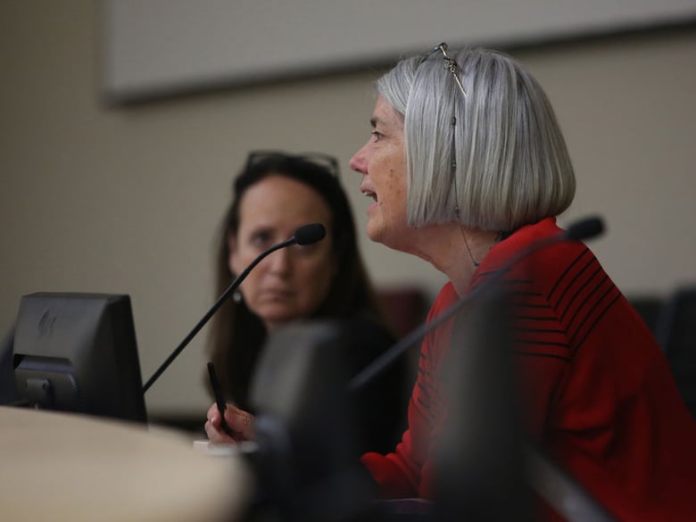 Frances Spivy-Weber, right, of the State Water Resources Control Board, discusses emergency conservation regulations at a board meeting in 2015. 