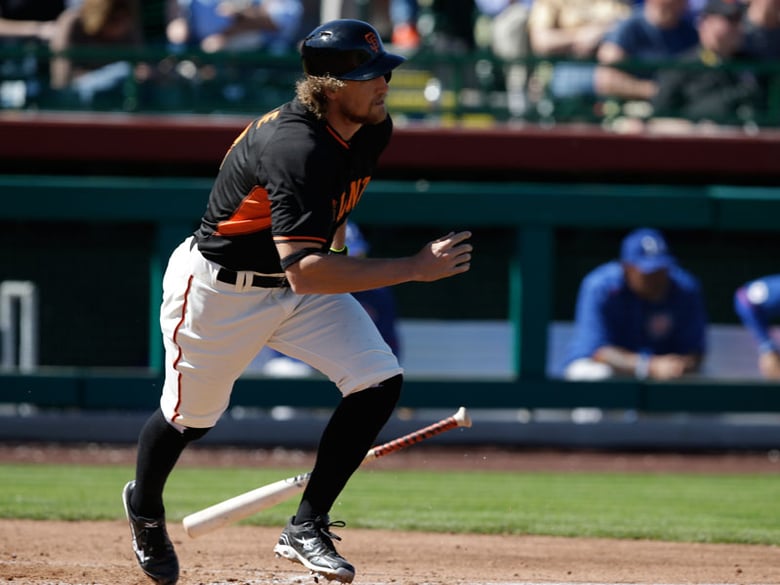 San Francisco Giants' Hunter Pence (8) hit during a spring training baseball game against the Chicago Cubs, Thursday, March 5, 2015, in Scottsdale, Ariz. 
