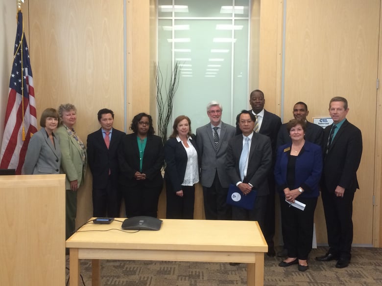 Representatives of education advocacy groups - including the California Teachers Association and the California School Boards Association - pose for a photo after a news conference Monday in Sacramento.