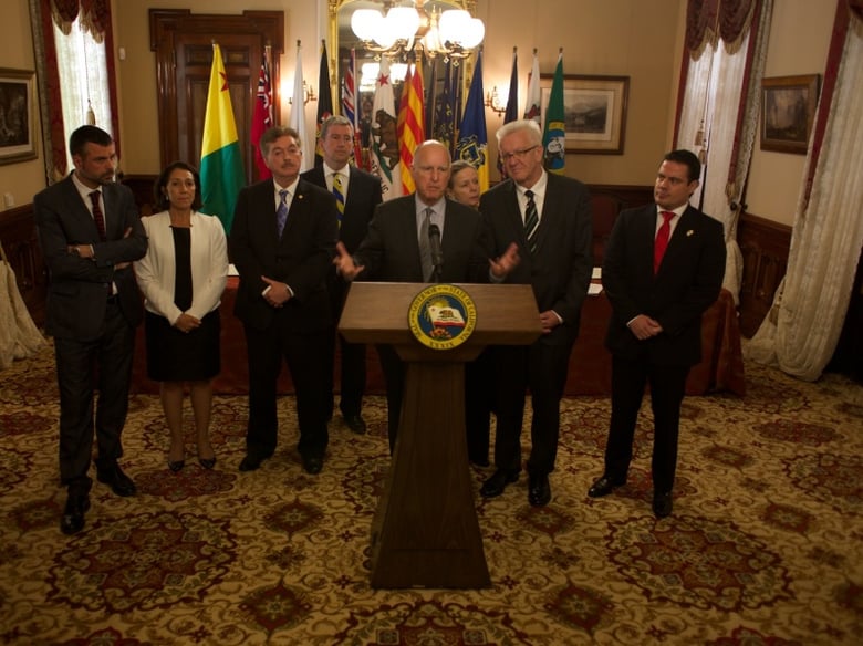 Gov. Jerry Brown explains the non-binding climate agreement he and regional leaders from several other countries were about to sign on Tuesday, May 19, 2015.