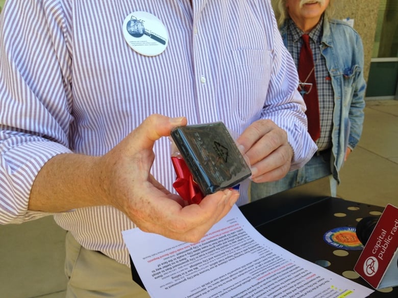 Erik Smitt of Eye On Sacramento holds a storage unit he says would hold at least 10 million emails. The group spent $65 on it and gave it to the City of Sacramento, along with a request to delay deletion of millions of old emails. 
