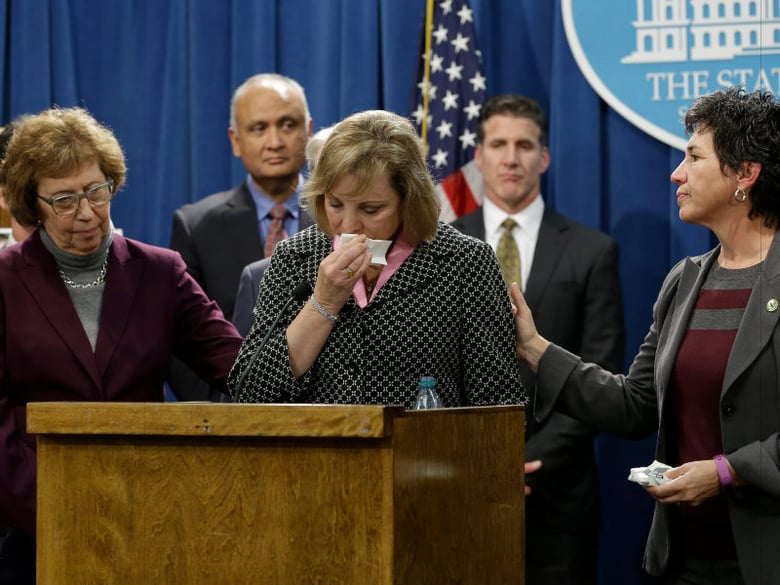 Debbie Ziegler, center, the mother of Brittany Maynard, is comforted by Sen. Lois Wolk, D-Davis, left, and Assemblymember Susan Talamantes Eggman, D-Stockton, in this file photo from a news conference at the Capitol, Wednesday, Jan. 21, 2015.