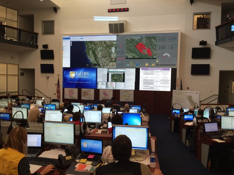 California Office of Emergency Services employees monitor wildfires around the state. 