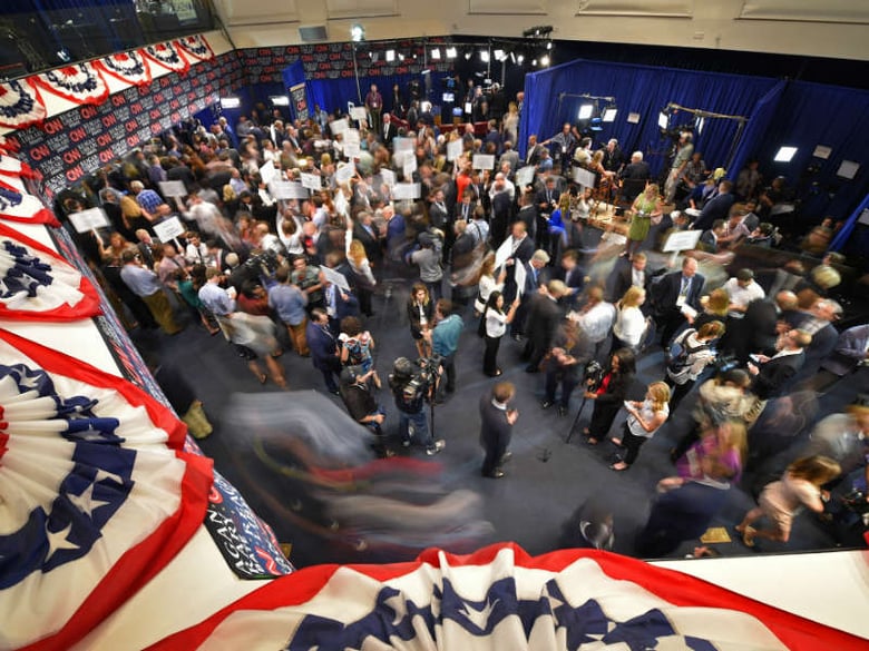 Journalists, candidates and their representatives crowd the spin room following the CNN Republican presidential debate at the Ronald Reagan Presidential Library and Museum on Wednesday, Sept. 16, 2015, in Simi Valley, Calif.