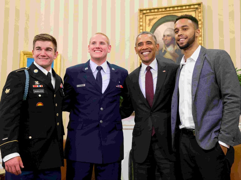 President Barack Obama poses for a photograph with Oregon National Guardsman, from left, Alek Skarlatos Air Force Airman 1st Class Spencer Stone, and Anthony Sadler, in the Oval Office of the White House in Washington, Sept. 17, 2015.