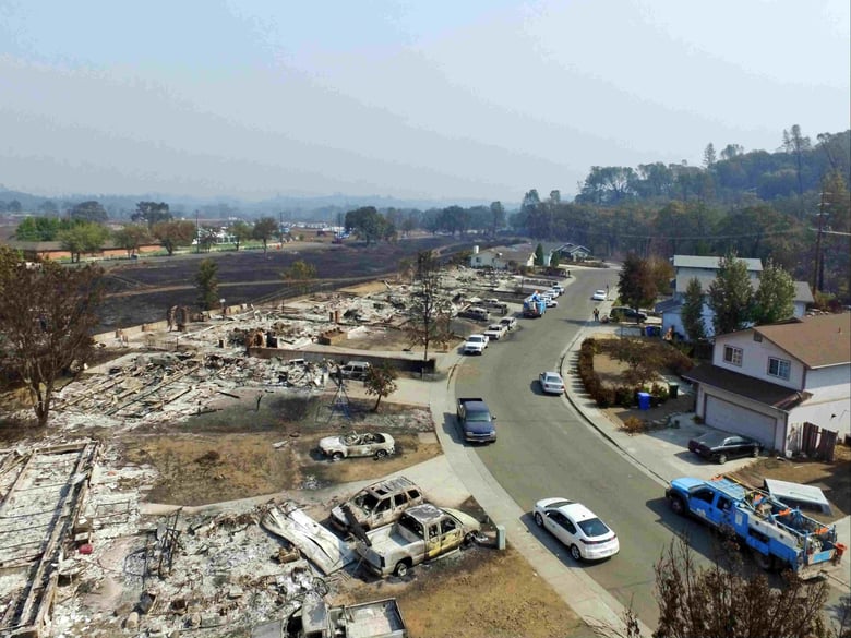 This image taken with a drone shows a street in Middletown, Calif., where several homes were completely destroyed by the Lake County wildfire, Tuesday, Sept. 15, 2015. 