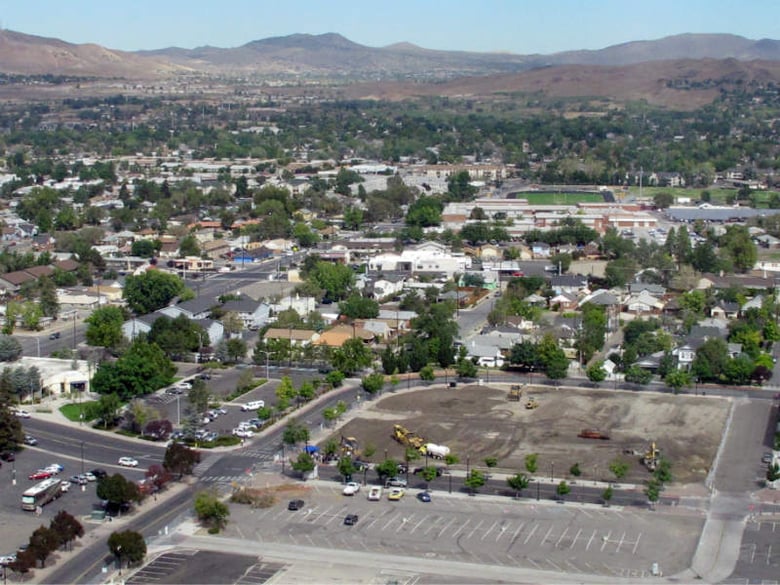 This Sept. 28, 2015 photo shows the vacant lots north of U.S. Interstate 80 where an urban renewal project with housing and retail space is planned at Victorian Square in Sparks, Nev.