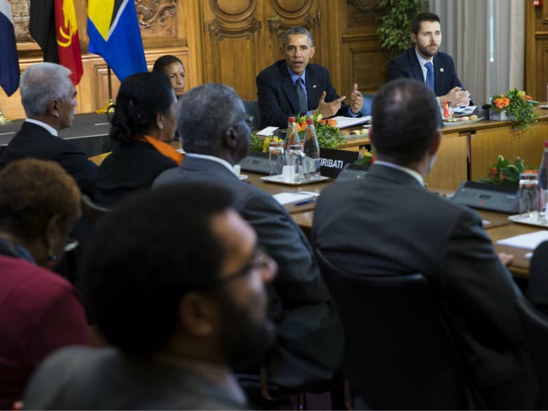 U.S. President Barack Obama speaks during a meeting with heads of state from small island nations most at risk from the harmful effects of climate change, in Paris, on Tuesday, Dec. 1, 2015. 