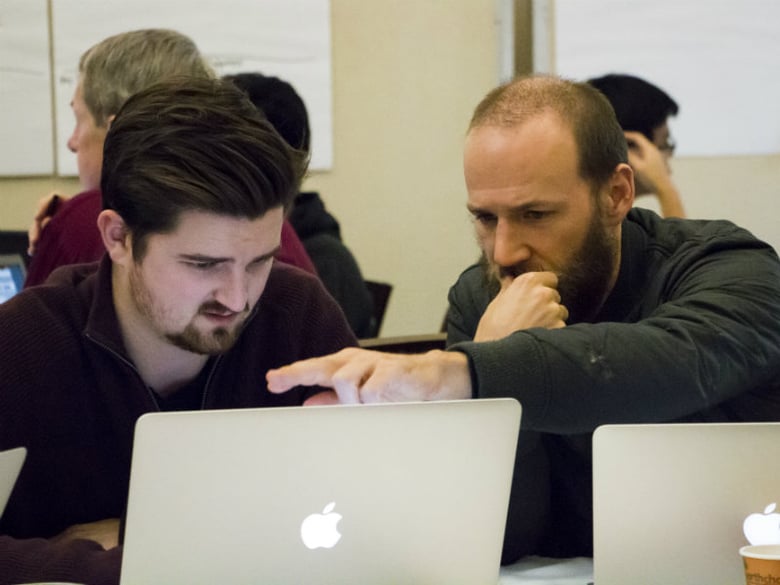 Developers collaborate at the Apps for Ag Hackathon at UC Davis. 
