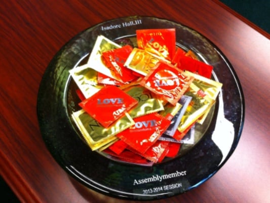 A bowl of condoms in Assemblyman Hall's office.