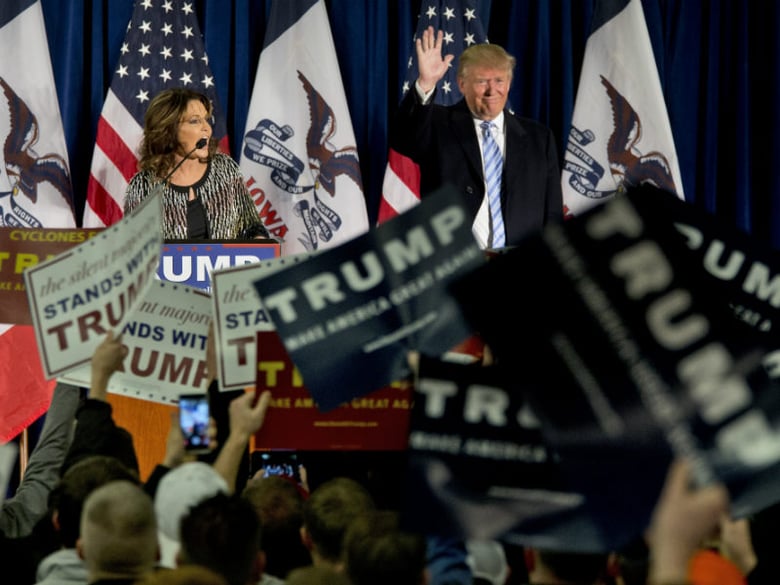 Former Alaska Gov. Sarah Palin, left, endorses Republican presidential candidate Donald Trump during a rally at the Iowa State University, Tuesday, Jan. 19, 2016, in Ames, Iowa.