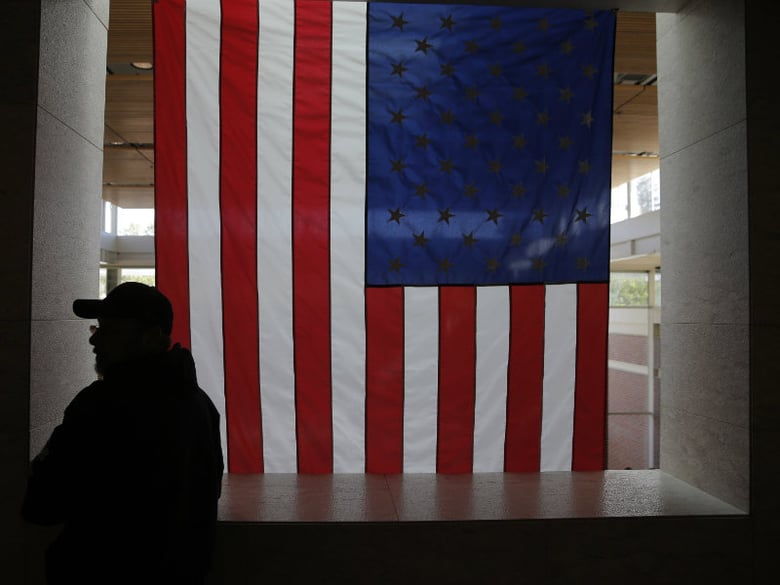 Rick Davies waits for an event to begin before the leading candidates for U.S. Senate debate at The University of the Pacific in Stockton, Calif., on Monday, April 25, 2016.
