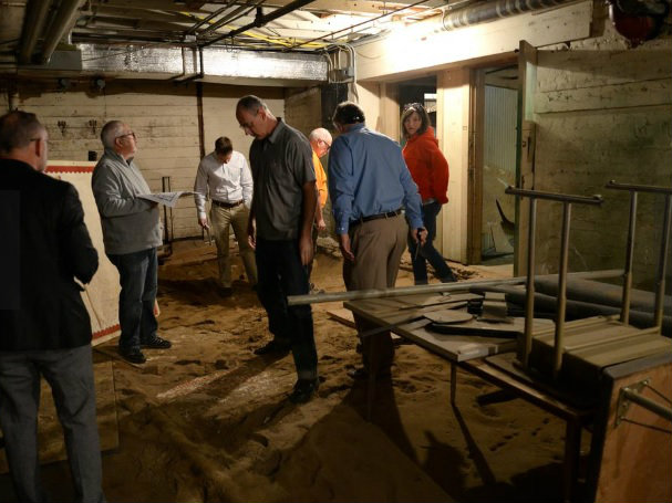 School district officials lead a tour inside the historic Marshall School at G and 27th streets in midtown Sacramento. 