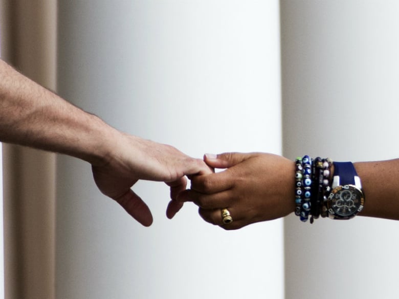 Mourners join hands while standing outside the visitation for Pulse nightclub shooting victim Javier Jorge-Reyes Wednesday, June 15, 2016, in Orlando, Fla. 

