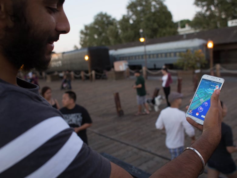 Kanwalprit Bagri of Sacramento plays Pokemon Go in Old Sacramento on Tuesday, July 19, 2016. 