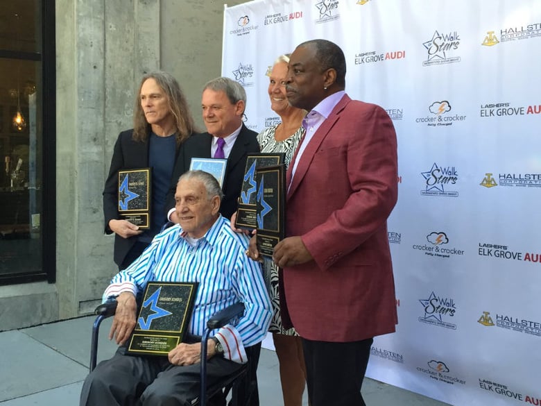 Sacramento Walk of Fame honorees pose with their plaques at the unveiling event Wednesday morning. 
