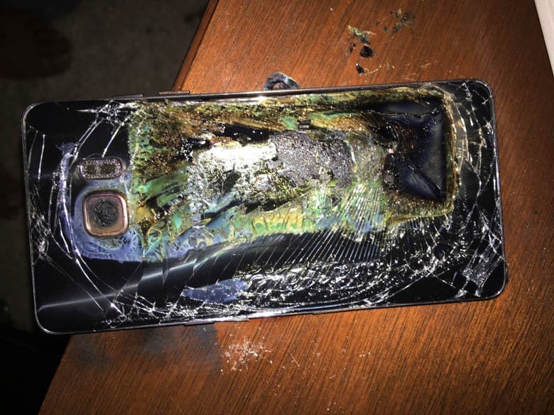 This Sunday, Oct. 9, 2016, photo shows a damaged Samsung Galaxy Note 7 on a table in Richmond, Va., after it caught fire earlier in the day. 