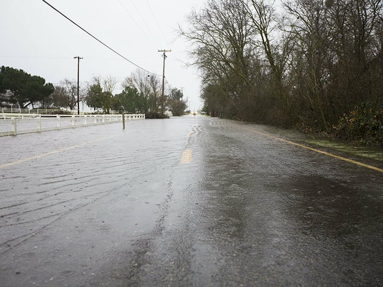 A flooded road near Wilton, Calif. on Jan. 8, 2017. Officials are monitoring the Cosumnes River nearby.